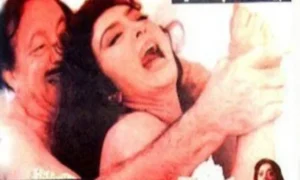 الفنانة نبيلة عبيد والفنان أبوبكر عزت في لقطة من فيلم المرأة والساطور  