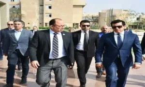 وزير الرياضة مع رئيس جامعة حلوان