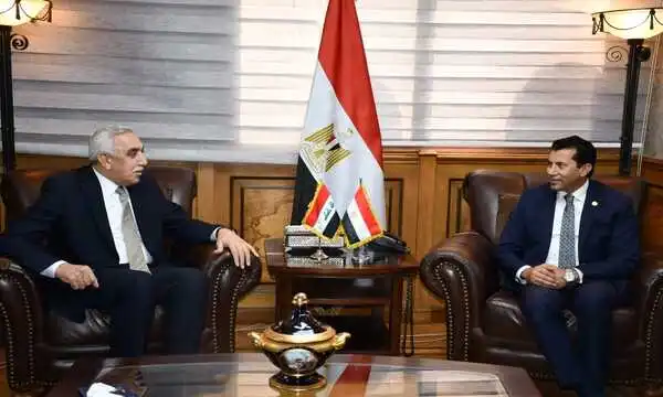 الدكتور أشرف صبحي وزير الشباب والرياضة مع الدكتور أحمد نايف رشيد الدليمي سفير العراق بمصر
